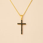 Colar Dourado de Cruz Cravejado de Pedra Natural Negra Auryn - Minha loja