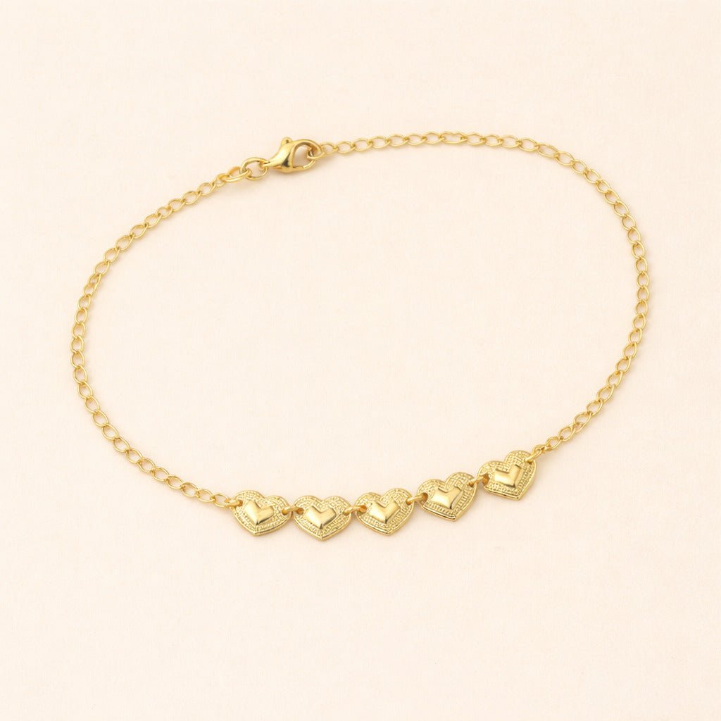 Kit: Tornozeleira Banhada a Ouro 5 Corações e Pulseira Banhada a Ouro Religiosa Cruz com Pérolas e Coração Madrepérola - Auryn Store