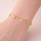 Pulseira Dourada com Pingentes de Coração e Estrela Auryn - Minha loja