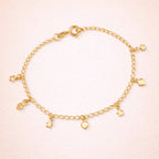 Pulseira Dourada com Pingentes de Coração e Estrela Auryn - Minha loja