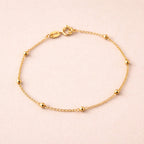 Pulseira Dourada de Bolinhas Delicada Auryn - Minha loja