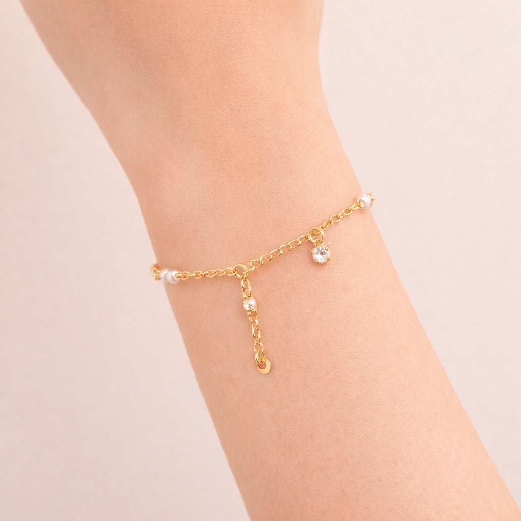 Pulseira Dourada de Pérolas com Ponto de Luz Auryn - Minha loja