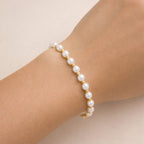 Pulseira Dourada de Pérolas e Bolinhas Auryn - Minha loja