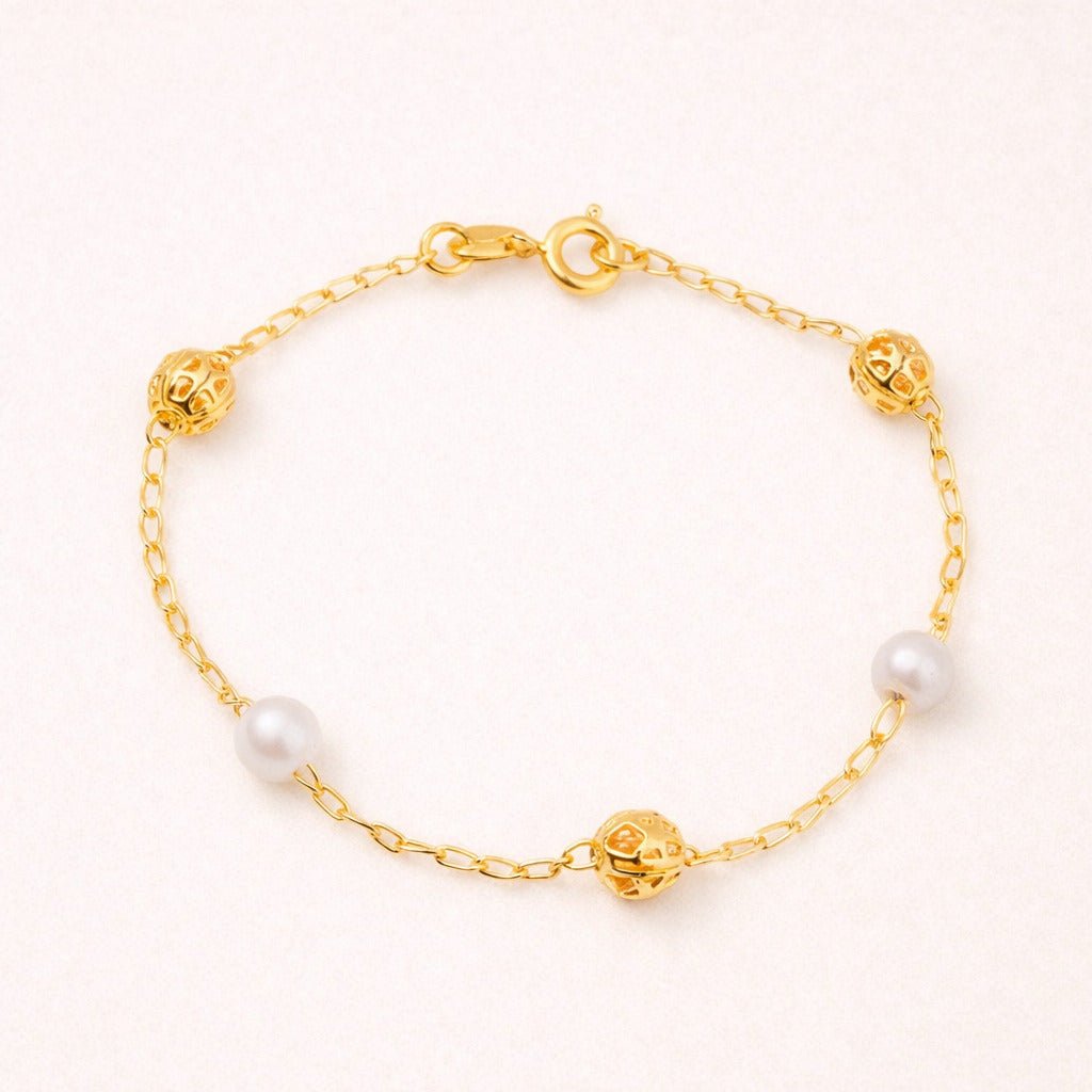 Pulseira Dourada de Pérolas e Esferas Vazadas Auryn - Minha loja