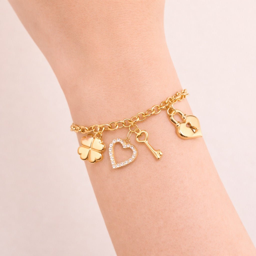 Pulseira Dourada Elo Português com Coração, Cadeado, Trevo e Chave Auryn - Minha loja