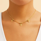 Pulseira Dourada Lisa com 3 Pingentes de Coração Auryn - Minha loja