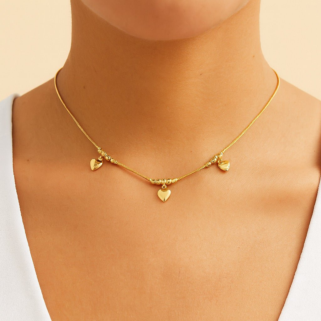 Pulseira Dourada Lisa com 3 Pingentes de Coração Auryn - Minha loja