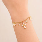 Pulseira Dourada Religiosa Cruz de Pérolas Coração Madrepérola Ponto de Luz Auryn - Minha loja