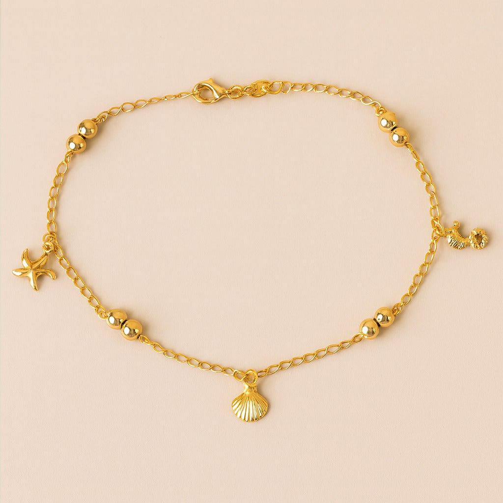 Tornozeleira Dourada Fundo do Mar e Bolas Auryn - Minha loja