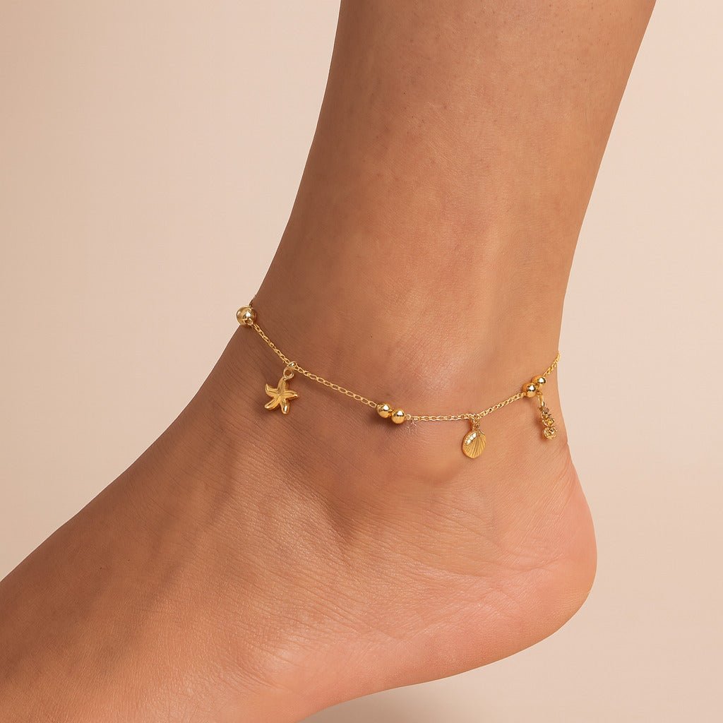 Tornozeleira Dourada Fundo do Mar e Bolas Auryn - Minha loja